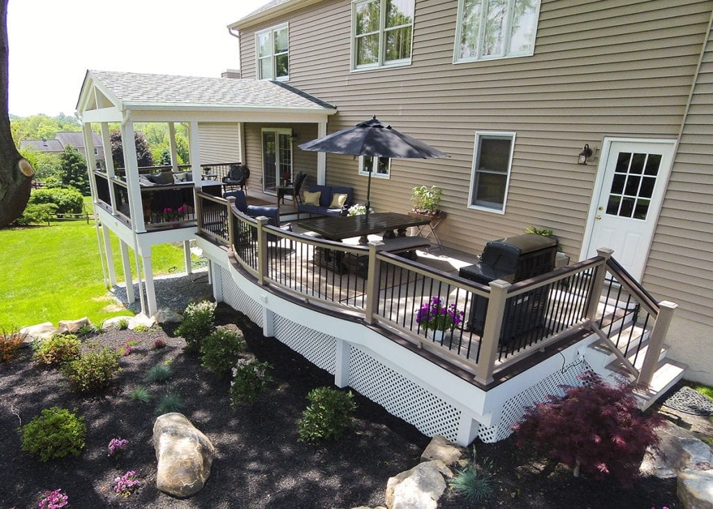 backyard deck design matching the yard