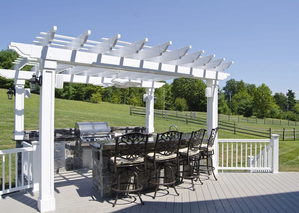 outdoor grilling station covered with pergola