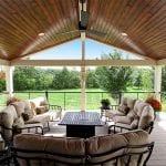 interior of a furnished porch with ceiling fan