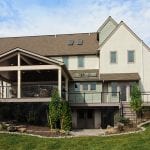 azek deck and porch surrounded by gardening and landscaping