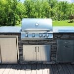 Belles - TimberTech Ashwood deck and porch with concrete kitchen counter top