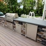 Manning - Ashwood Timbertech deck and kitchen with grill and refrigerator