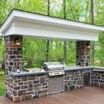 Arjan Timbertech Deck and porch with stonework Kitchen