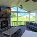 Barba - TimberTech deck and screened porch fireplace