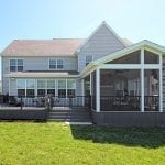 Barba - TimberTech deck and screened porch with stonework