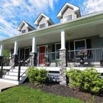 Davis - Front porch with timbertech deck and stonework