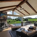 Lo - TimberTech Deck and porch with stonework and barnwood