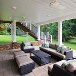 Casey - Flagstone patio with stonework and under deck oasis with TV