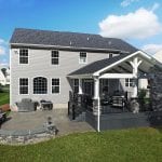 Custom Amazon Mist TimberTech Deck Porch Patio with covered fireplace and tv in Collegeville, PA