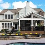 Custom Mocha TimberTech Barnwood Covered Porch and patio with stone Garnet Valley, PA