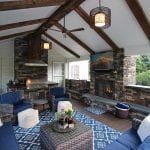 Custom Mocha TimberTech Barnwood Covered Porch with built fireplace and tv Garnet Valley, PA