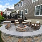 Stamped concrete patio with techo bloc sitting wall in west chester pa