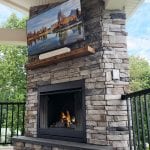 Zook - PA ledgestone veneer fireplace with barnwood mantel