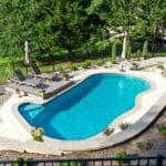 low angle view of concrete pool and patio