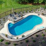 overhead view of concrete pool and patio showing depth