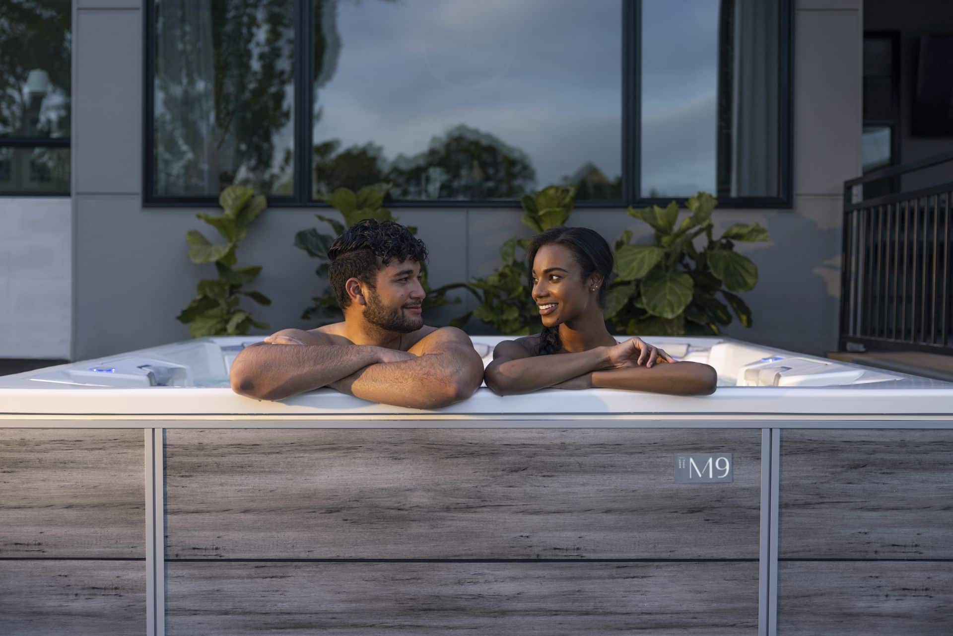 couple relaxing in a hot tub