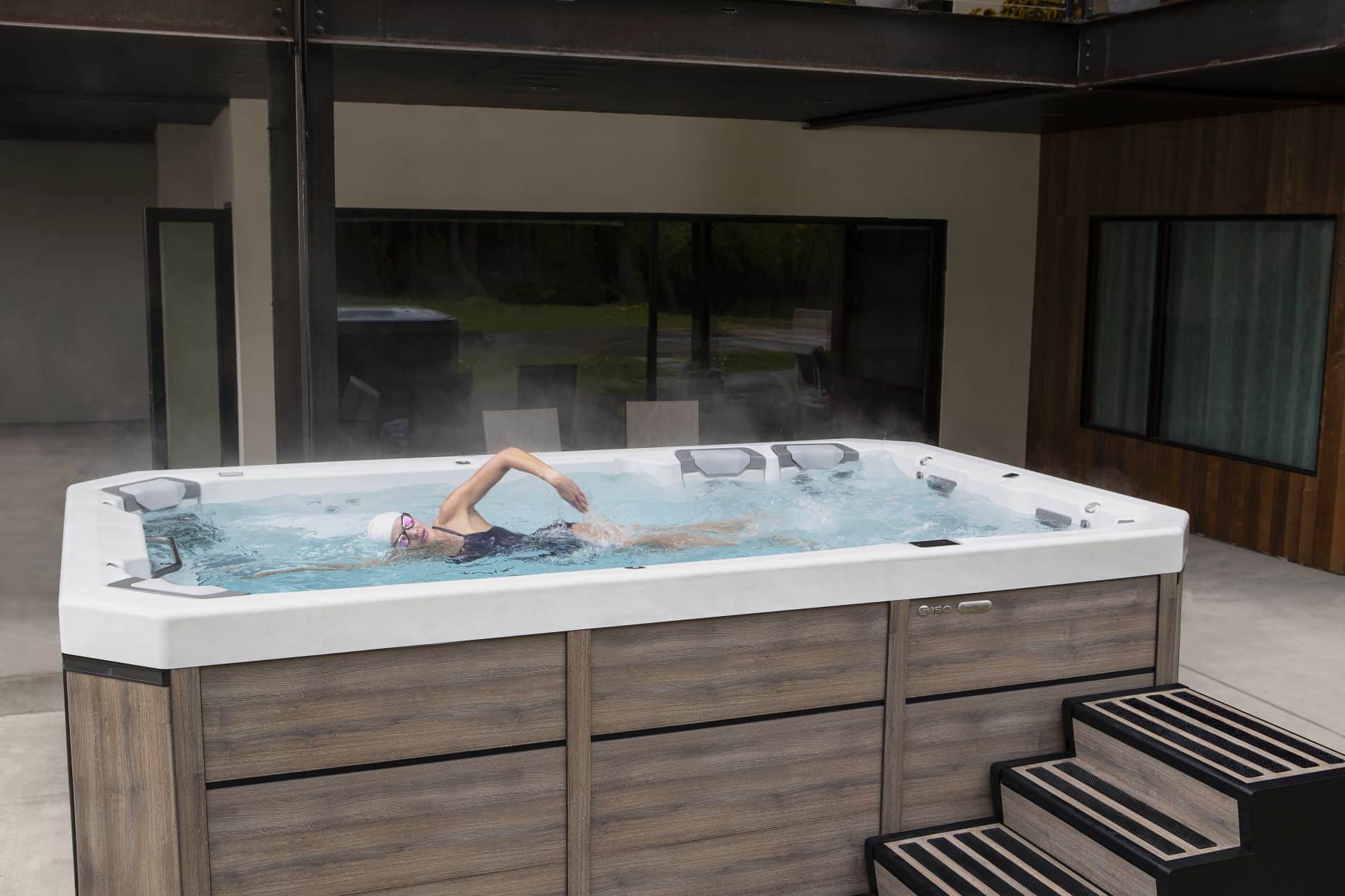 swimmer in flowing hot tub