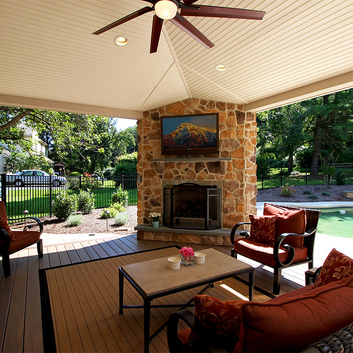 new porch complete with gorgeous stonework and fireplace