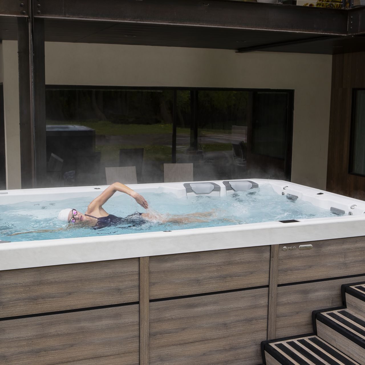 swimmer in flowing hot tub